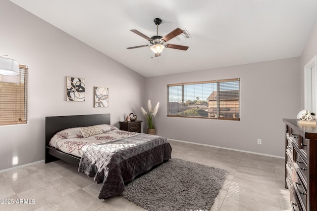 bedroom featuring visible vents, vaulted ceiling, baseboards, and ceiling fan