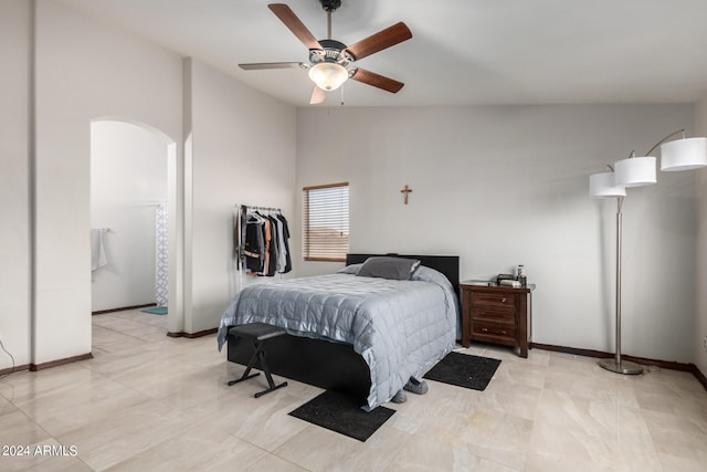 bedroom featuring high vaulted ceiling, ceiling fan, and light tile patterned floors