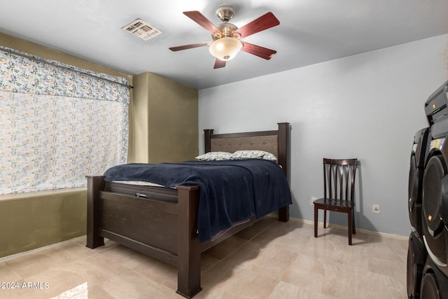 bedroom featuring ceiling fan and light tile patterned flooring