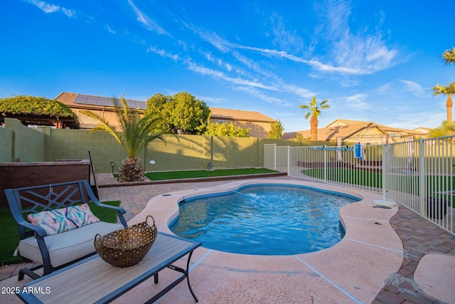 view of pool with a patio area, a fenced backyard, and a fenced in pool