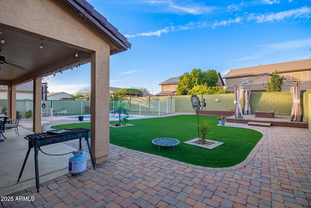 view of patio with a fenced backyard, a playground, and a gazebo