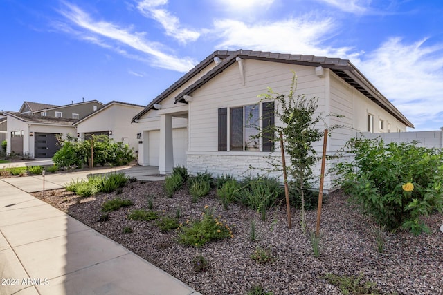 35612 N Lodestone Dr, San Tan Valley, AZ 85144 - view of front of home featuring a garage and concrete driveway