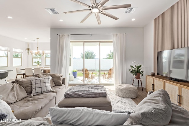 35612 N Lodestone Dr, San Tan Valley, AZ 85144 - living area with a chandelier, recessed lighting, ceiling fan, and wood finished floors