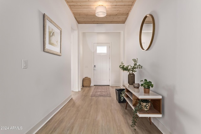 35612 N Lodestone Dr, San Tan Valley, AZ 85144 - doorway with wood ceiling, baseboards, and light wood-style flooring