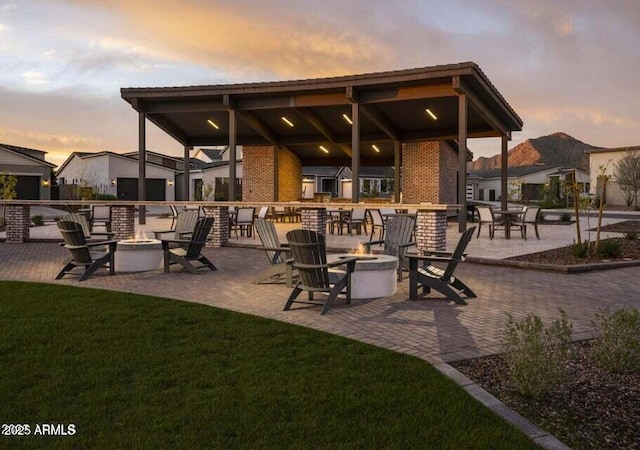 35612 N Lodestone Dr, San Tan Valley, AZ 85144 - view of patio / terrace with an outdoor fire pit and a gazebo