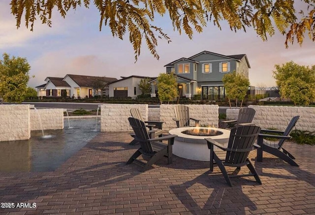 35612 N Lodestone Dr, San Tan Valley, AZ 85144 - view of patio / terrace with an outdoor fire pit