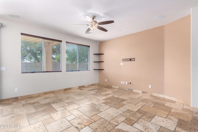 unfurnished room featuring ceiling fan