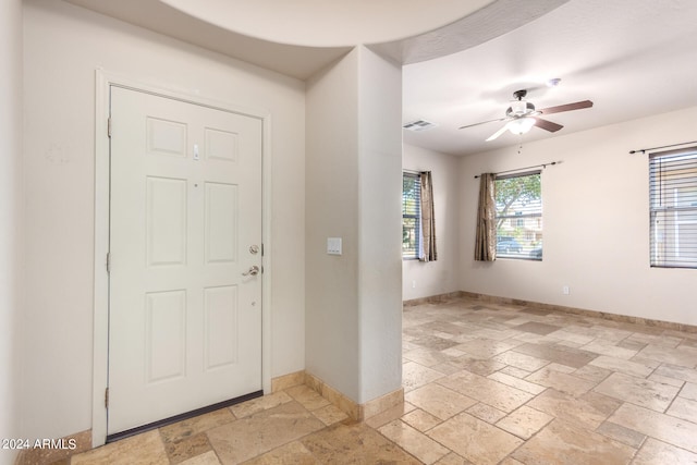 entryway with ceiling fan