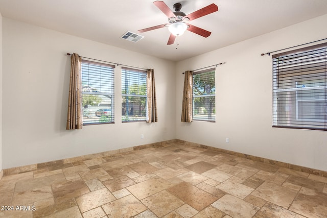 spare room featuring ceiling fan