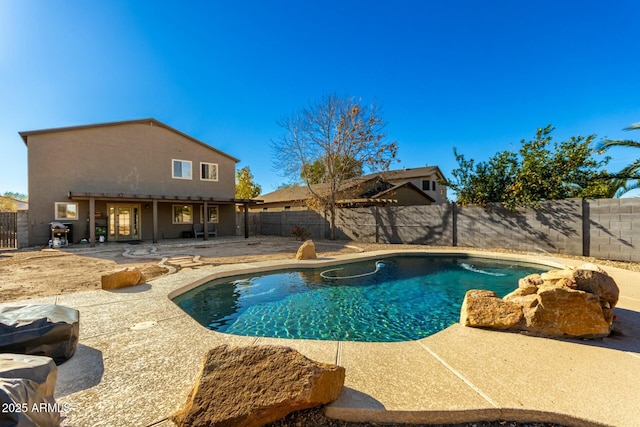 view of swimming pool with a patio