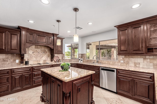 kitchen featuring dark brown cabinets, a sink, dishwasher, recessed lighting, and backsplash