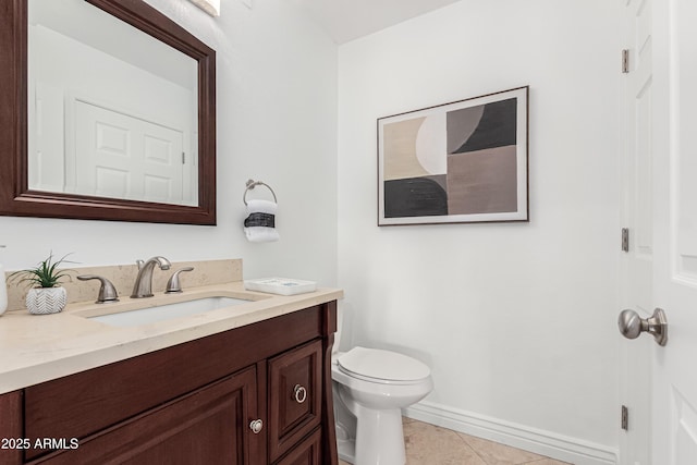 half bath featuring tile patterned flooring, baseboards, toilet, and vanity