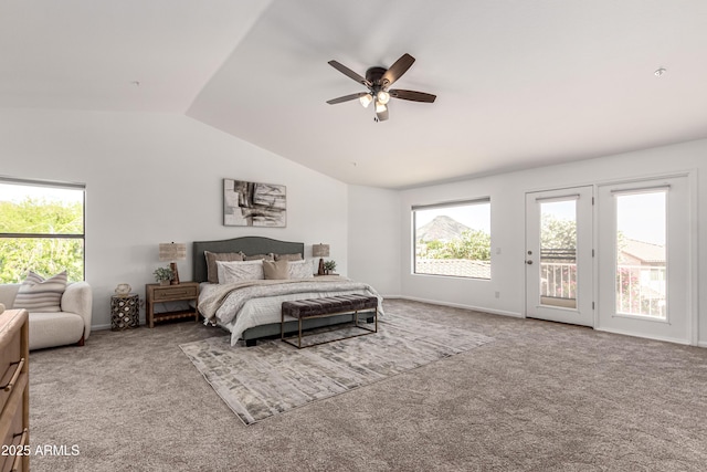 bedroom with carpet flooring, vaulted ceiling, access to exterior, and multiple windows