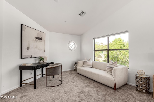 living room featuring carpet flooring, baseboards, visible vents, and lofted ceiling