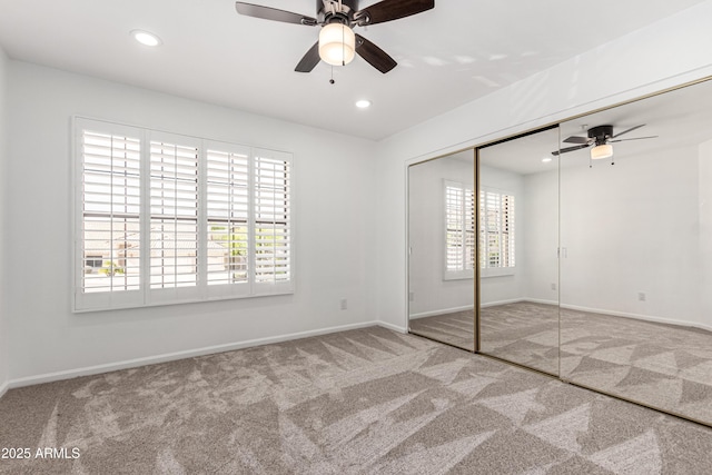 unfurnished bedroom featuring carpet flooring and recessed lighting