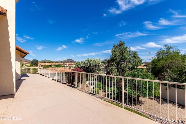 view of patio / terrace with a residential view and a balcony