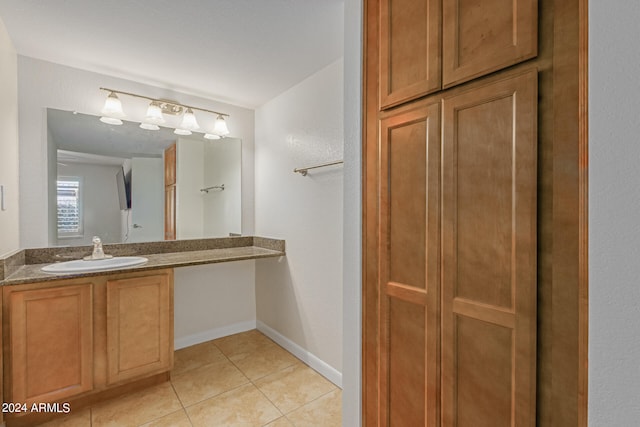 bathroom with vanity and tile patterned floors