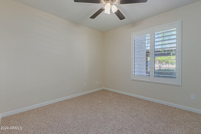 unfurnished room with carpet floors and ceiling fan