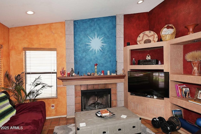 14605 S 35th Pl, Phoenix, AZ 85044 - living room with tile patterned flooring, a tiled fireplace, baseboards, and recessed lighting