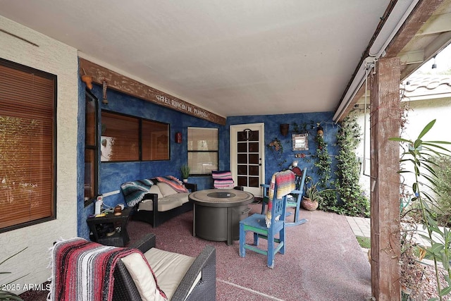14605 S 35th Pl, Phoenix, AZ 85044 - view of patio with an outdoor living space with a fire pit