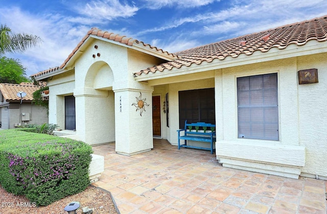 14605 S 35th Pl, Phoenix, AZ 85044 - entrance to property featuring stucco siding and a tiled roof