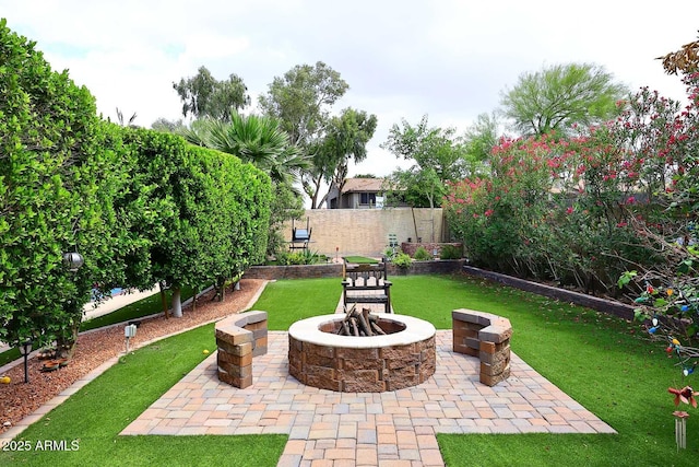 14605 S 35th Pl, Phoenix, AZ 85044 - view of yard featuring an outdoor fire pit and a patio area