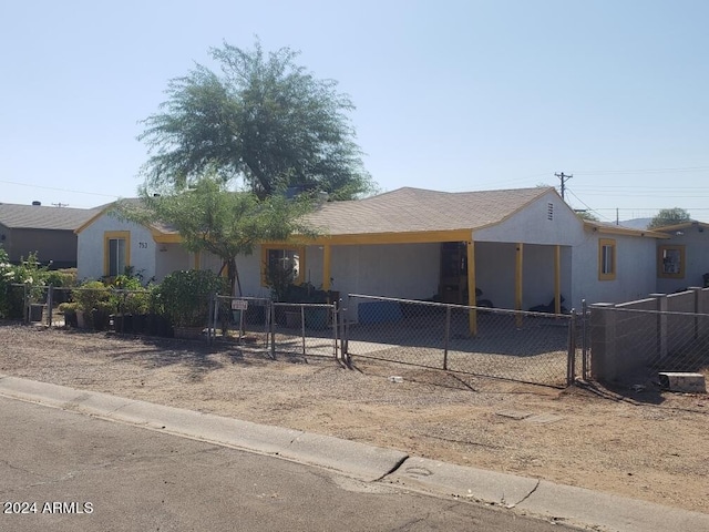 753 W Riverside St, Phoenix, AZ 85041 - view of front of house featuring a fenced front yard, a gate, and stucco siding