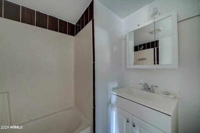 bathroom with vanity and shower / bath combination