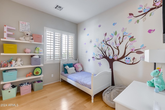 bedroom featuring light hardwood / wood-style floors