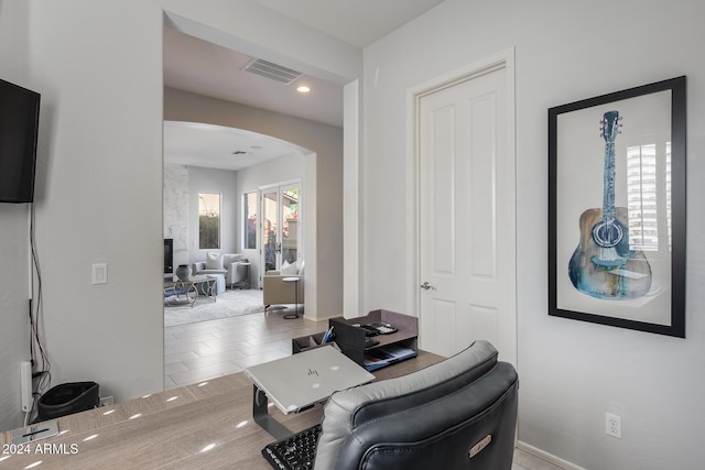 2340 W Horsetail Trl, Phoenix, AZ 85085 - home office featuring arched walkways, recessed lighting, baseboards, and tile patterned floors