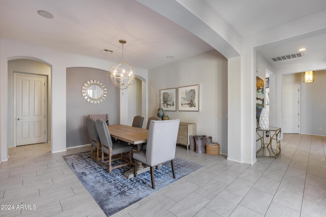 2340 W Horsetail Trl, Phoenix, AZ 85085 - dining space with arched walkways and baseboards