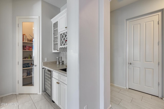 2340 W Horsetail Trl, Phoenix, AZ 85085 - indoor dry bar featuring wine cooler and baseboards