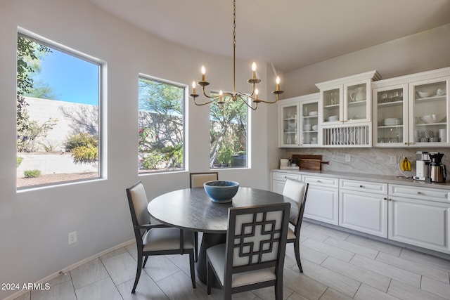 2340 W Horsetail Trl, Phoenix, AZ 85085 - dining space featuring a chandelier