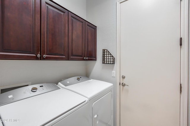 2340 W Horsetail Trl, Phoenix, AZ 85085 - laundry area featuring washer and dryer and cabinet space