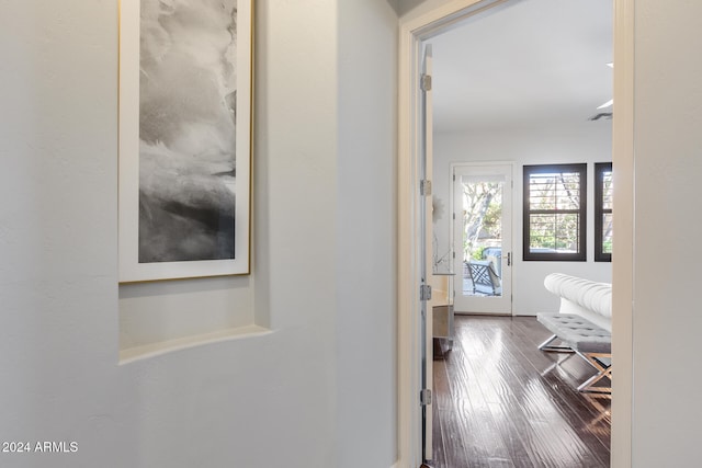 hallway featuring dark wood-type flooring