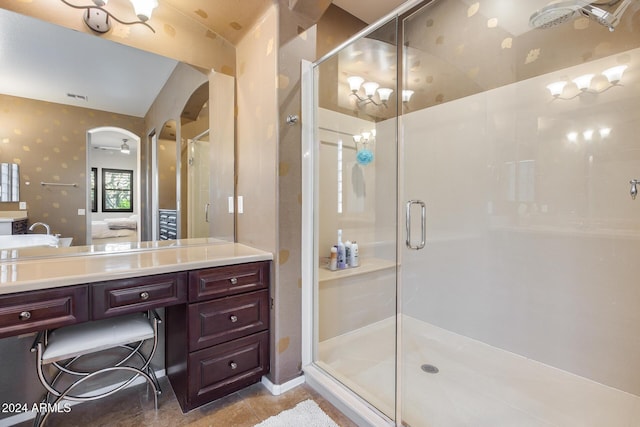 2340 W Horsetail Trl, Phoenix, AZ 85085 - ensuite bathroom featuring a stall shower, tile patterned flooring, vanity, and wallpapered walls