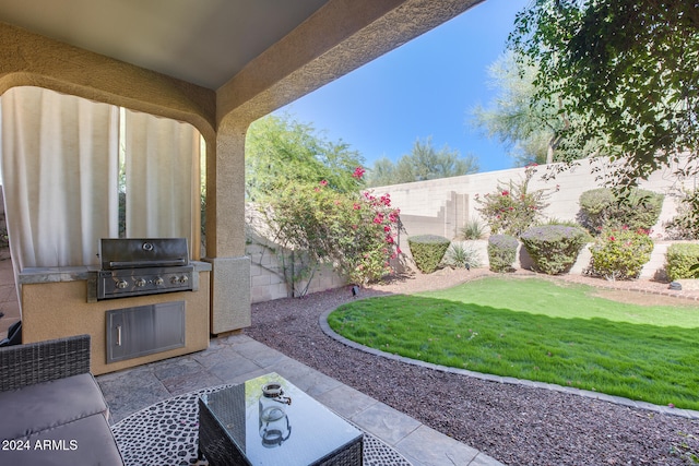 view of patio / terrace featuring a grill