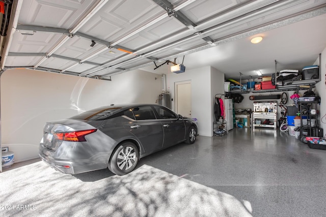 2340 W Horsetail Trl, Phoenix, AZ 85085 - garage featuring a garage door opener and water heater