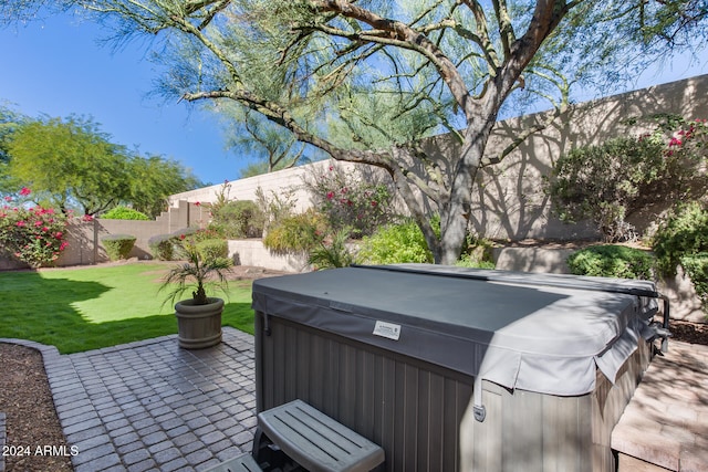 view of patio featuring a hot tub