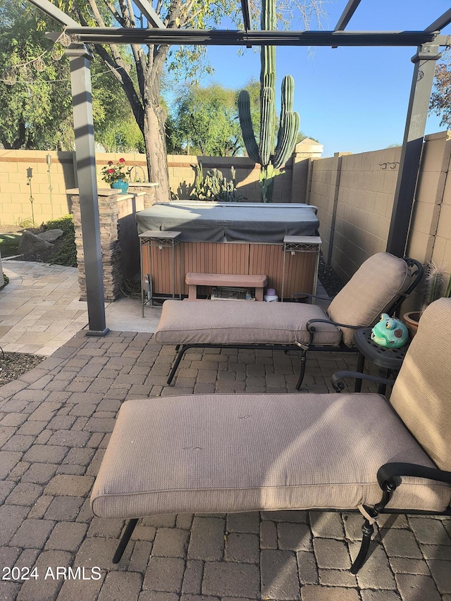 view of patio featuring a hot tub