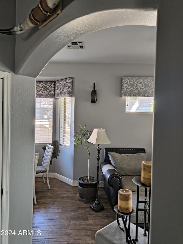 living area featuring hardwood / wood-style floors