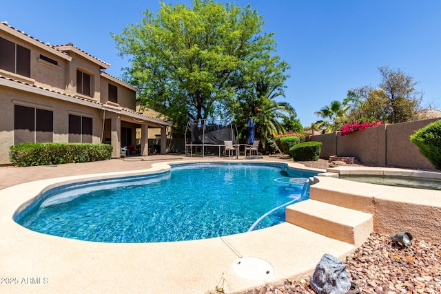 4123 S Wayne Pl, Chandler, AZ 85249 - view of swimming pool featuring a trampoline, a fenced backyard, and a patio