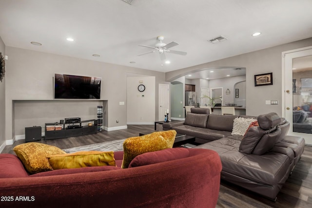 4123 S Wayne Pl, Chandler, AZ 85249 - living room with arched walkways, ceiling fan, wood finished floors, baseboards, and recessed lighting