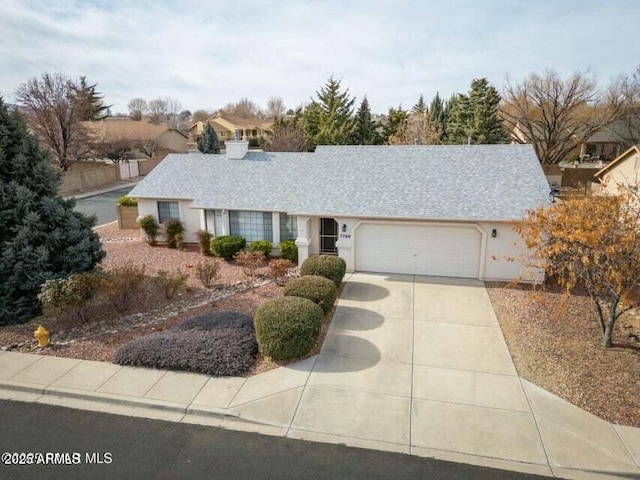 single story home with a garage