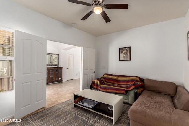 living room with a ceiling fan