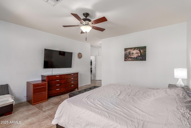 bedroom with light tile patterned floors, baseboards, visible vents, and ceiling fan