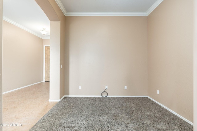 4253 N Yates Ave, Prescott Valley, AZ 86314 - empty room with arched walkways, ornamental molding, baseboards, and light colored carpet