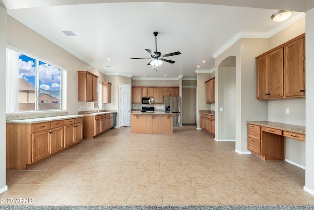 4253 N Yates Ave, Prescott Valley, AZ 86314 - kitchen featuring black appliances, a center island, ceiling fan, tasteful backsplash, and a sink