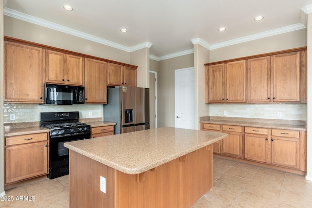 4253 N Yates Ave, Prescott Valley, AZ 86314 - kitchen with black appliances, a kitchen island, light tile patterned flooring, tasteful backsplash, and recessed lighting