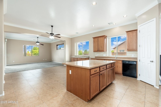 4253 N Yates Ave, Prescott Valley, AZ 86314 - kitchen with black dishwasher, light colored carpet, baseboards, a center island, and a ceiling fan